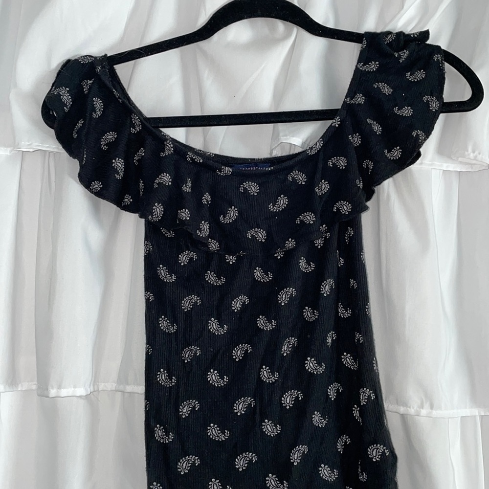 Off the shoulder shirt size small black with fun white pattern